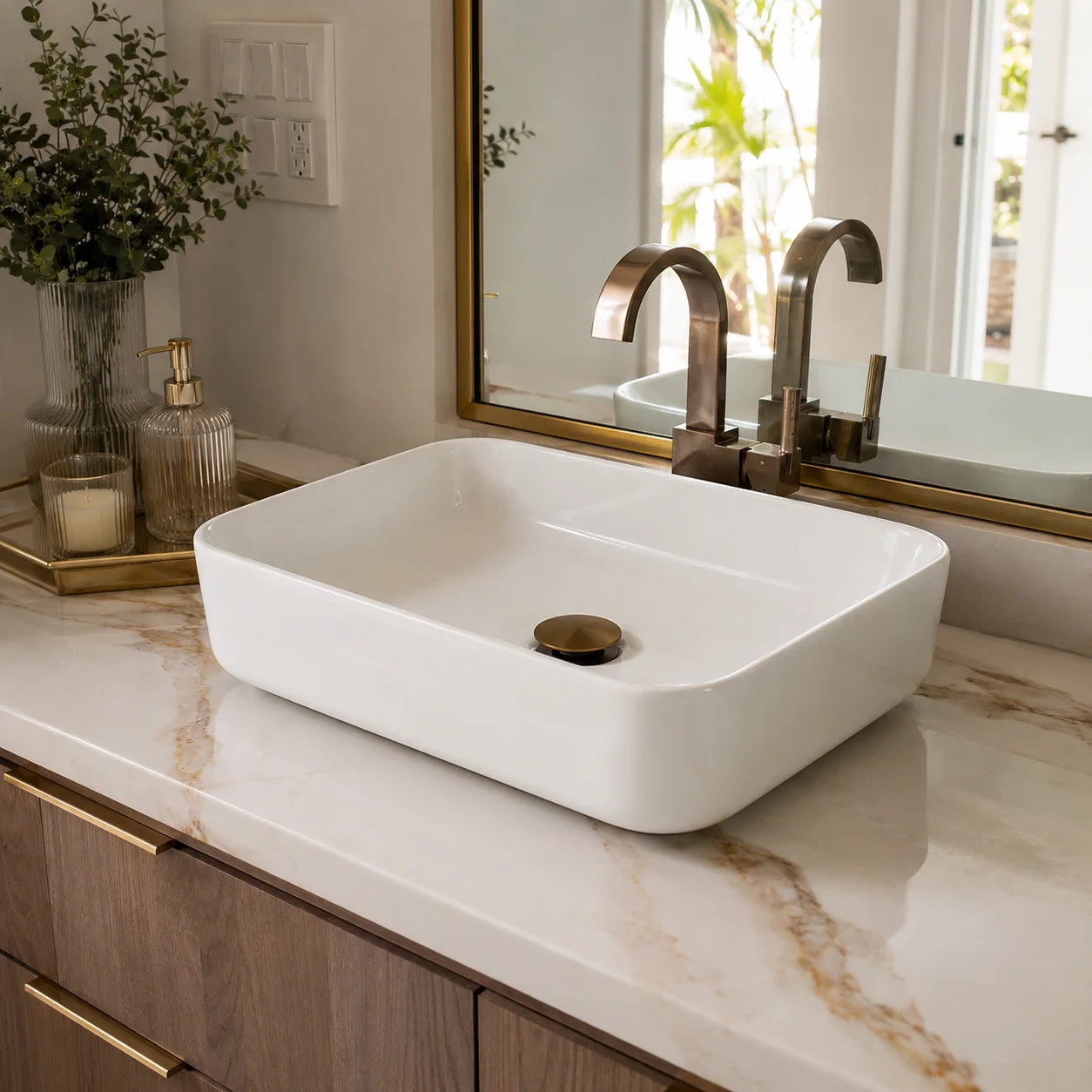 Avelisse™ high-gloss white rectangular vessel sink on a marble vanity